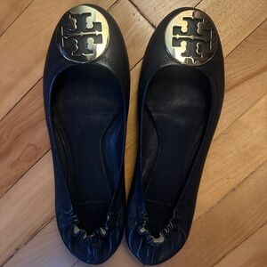Navy Tory Burch Black Flats with Gold Emblem